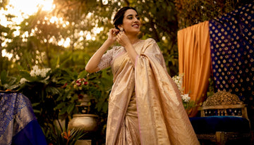 Woman in silk saree preparing for wedding